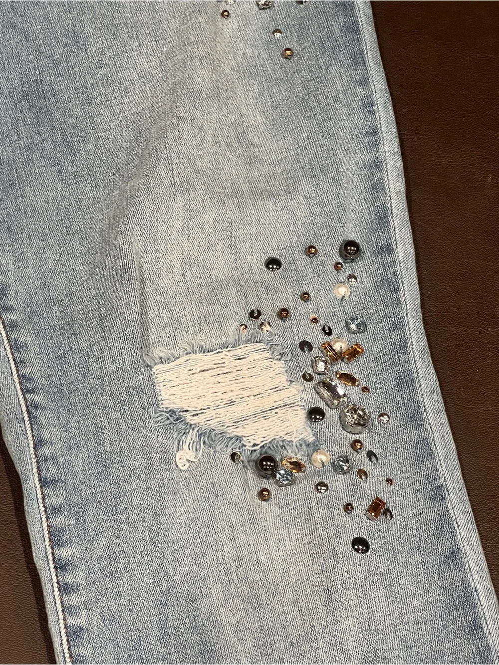 Chicos Light wash distressed jeans with rhinestones and studs size 1R